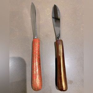 Set of two Michael Wainwright cheese knives